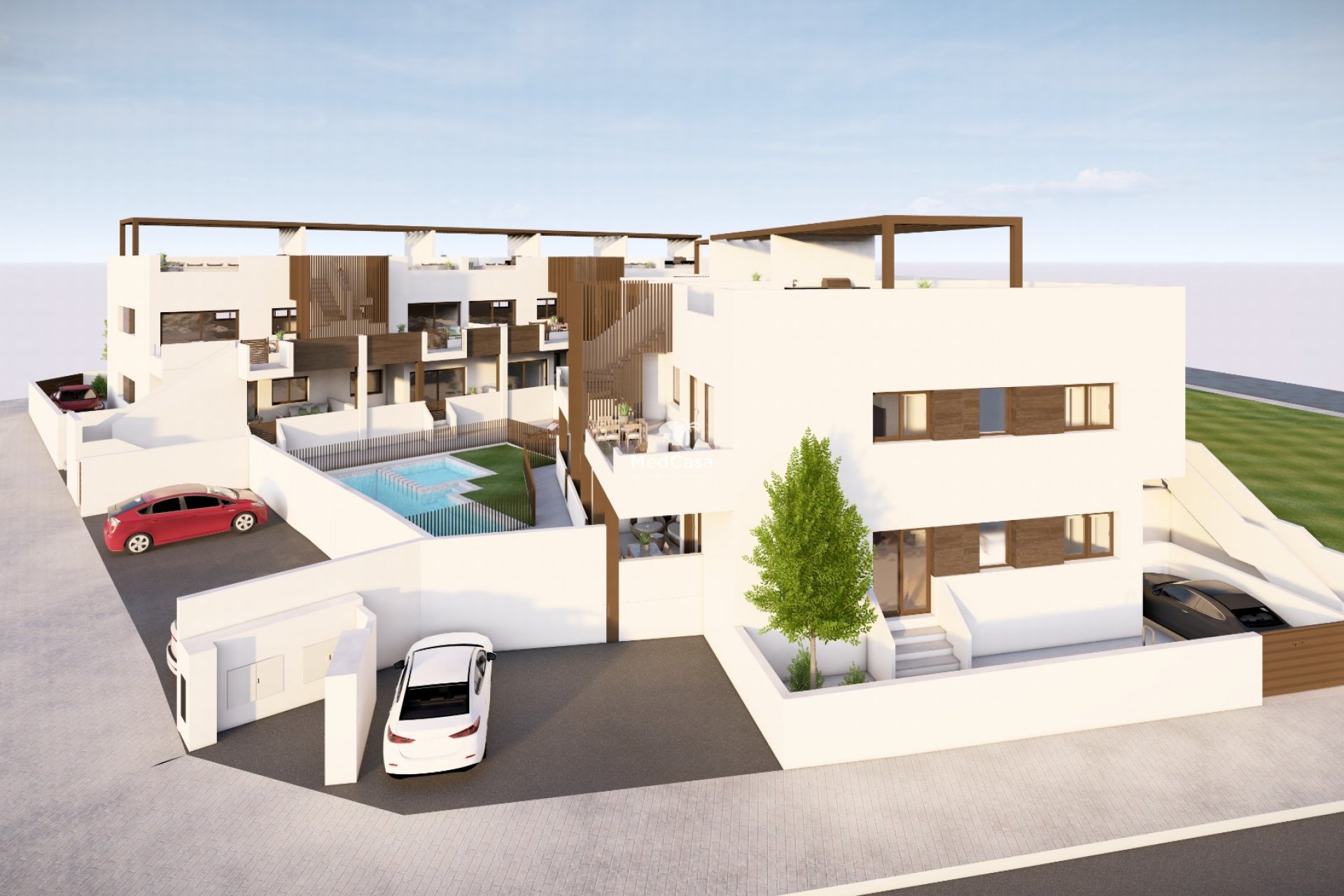 Pequeño complejo residencial tipo bungalow, amplias terrazas y piscina comunitaria