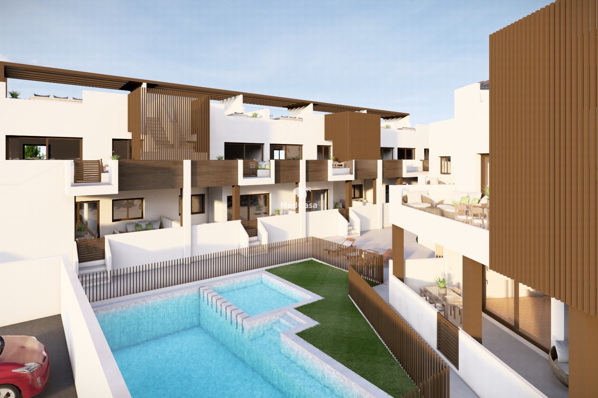 Pequeño complejo residencial tipo bungalow, amplias terrazas y piscina comunitaria