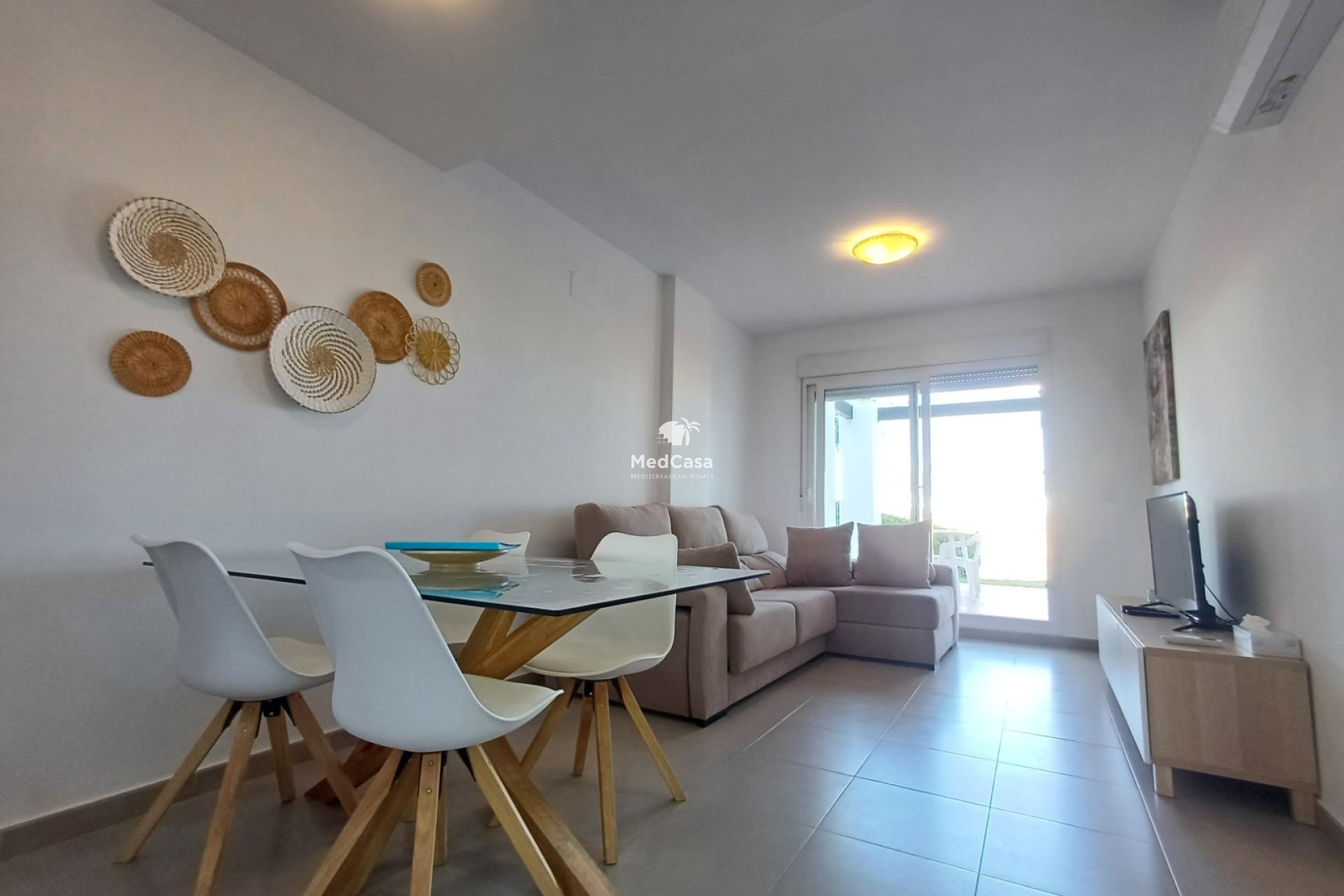 Segunda mano - Apartamento planta baja -
Roldan