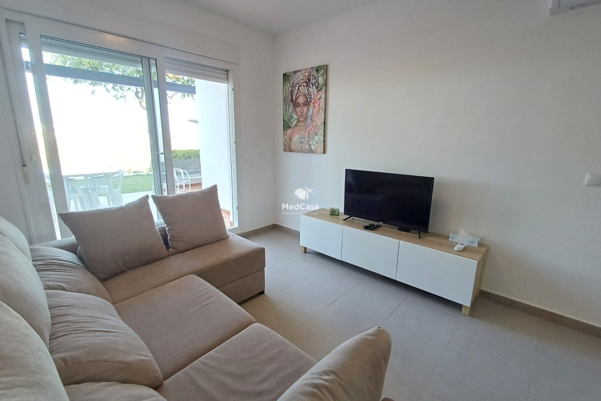 Segunda mano - Apartamento planta baja -
Roldan