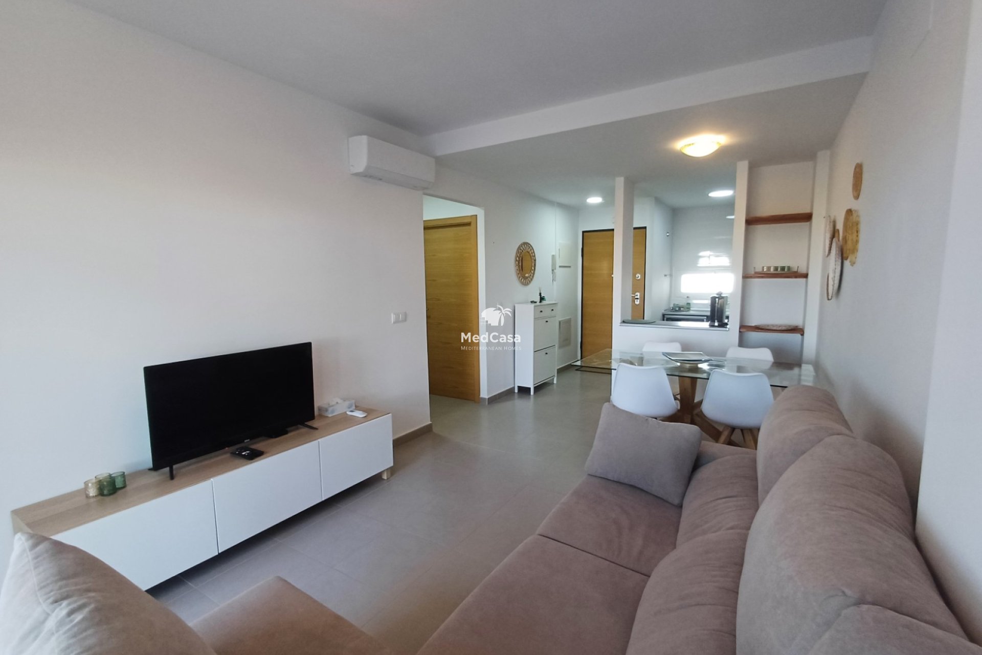 Segunda mano - Apartamento planta baja -
Roldan