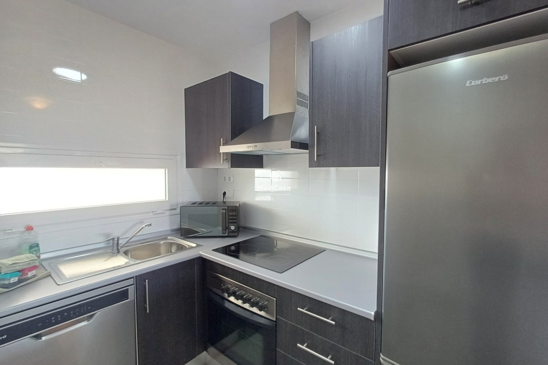 Segunda mano - Apartamento planta baja -
Roldan