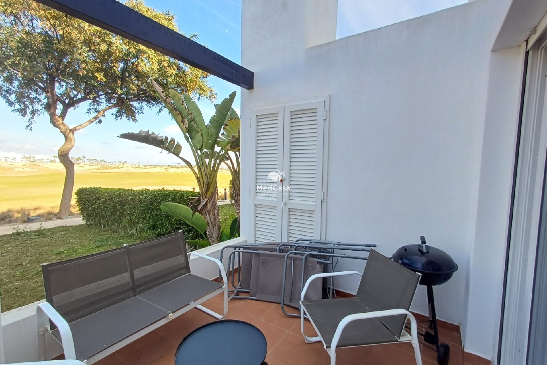 Segunda mano - Apartamento planta baja -
Roldan