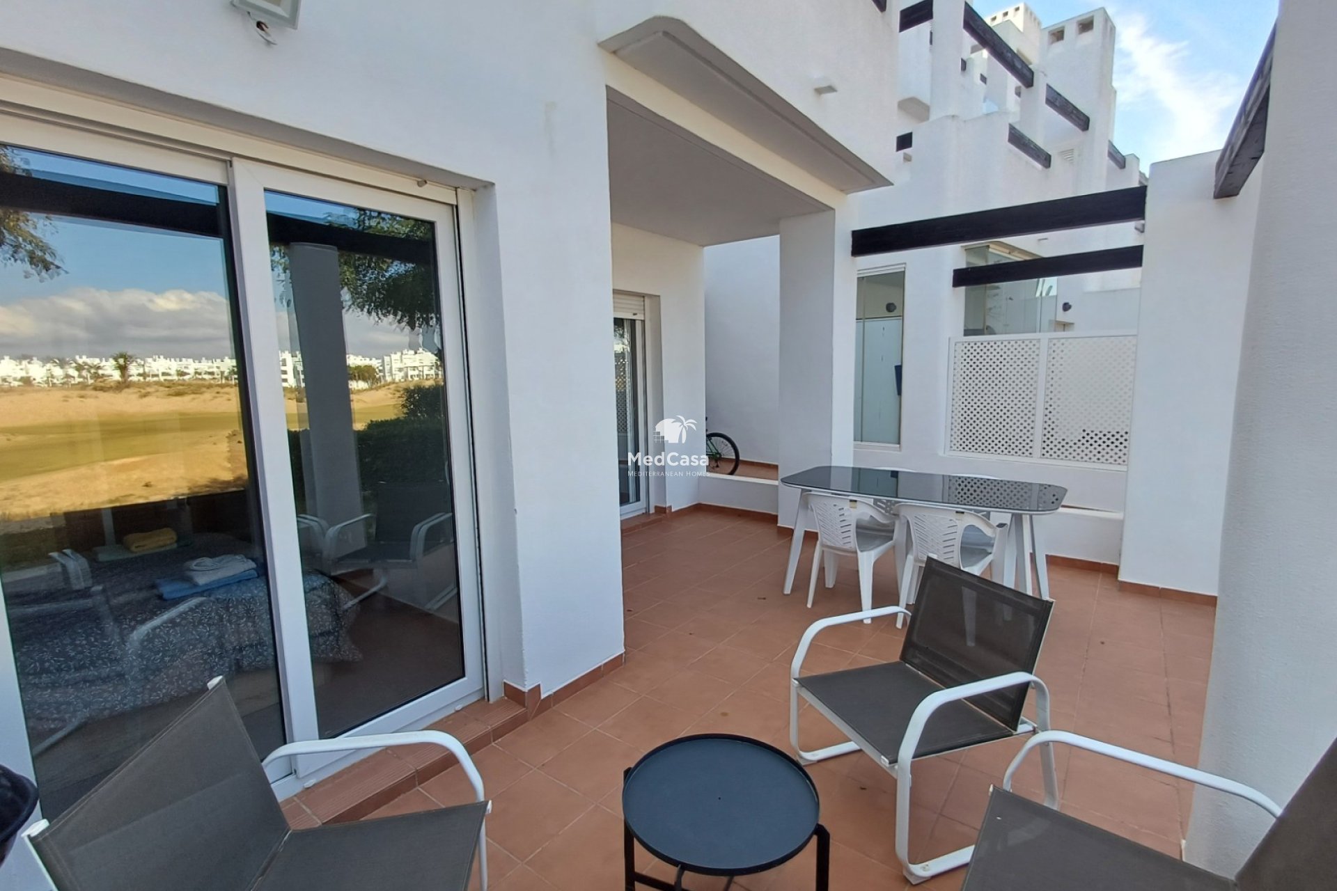 Segunda mano - Apartamento planta baja -
Roldan