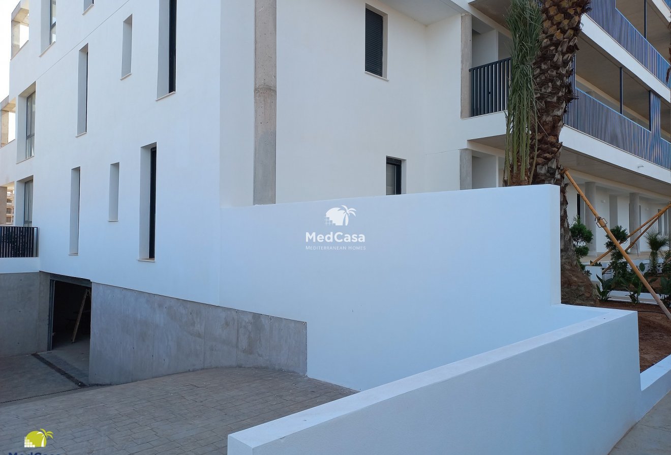 Obra nueva - Apartamento -
La Manga