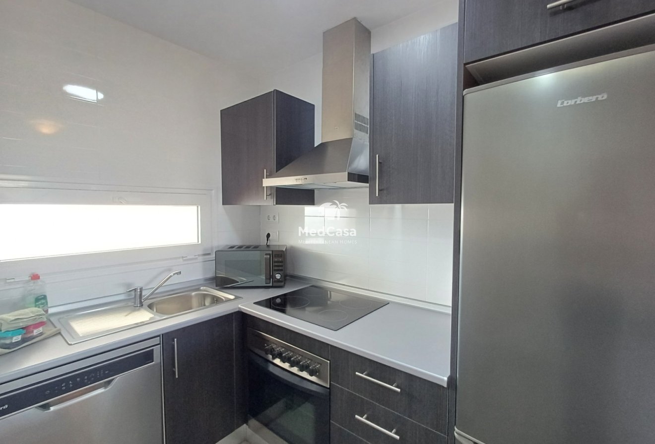 Segunda mano - Apartamento planta baja -
Roldan