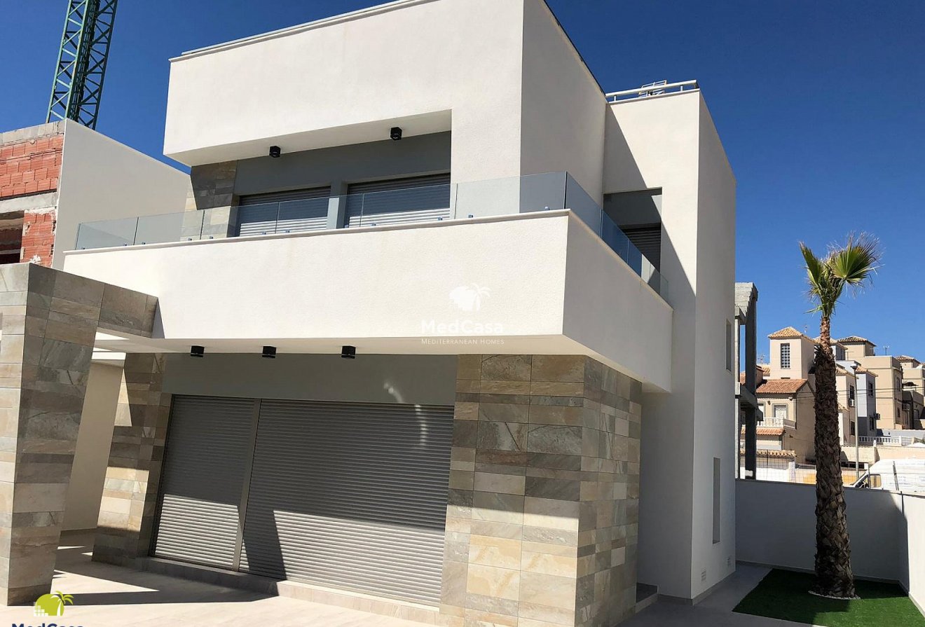 Obra nueva - Villa -
Orihuela Costa