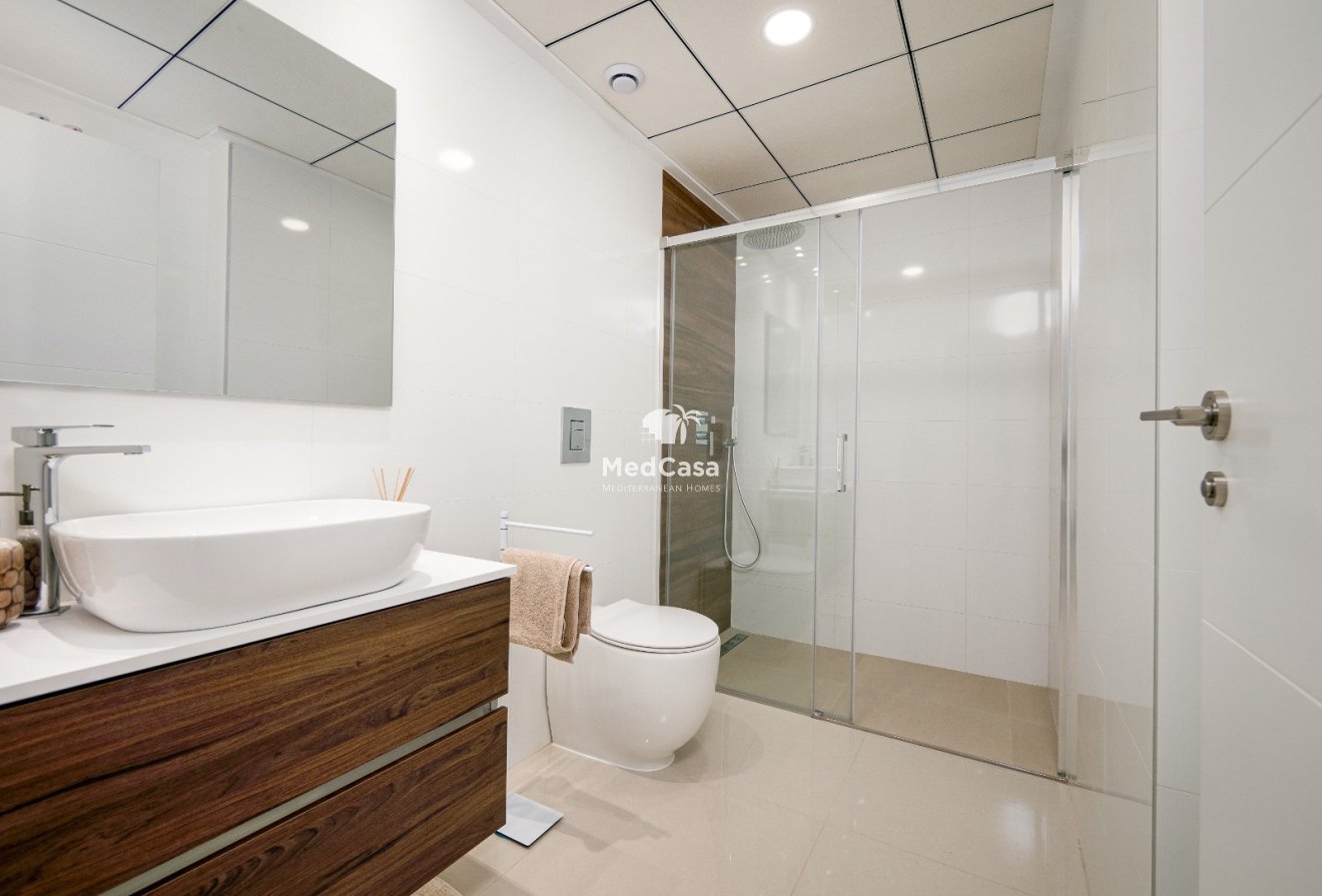 Obra nueva - Apartamento planta baja -
Golf La Finca