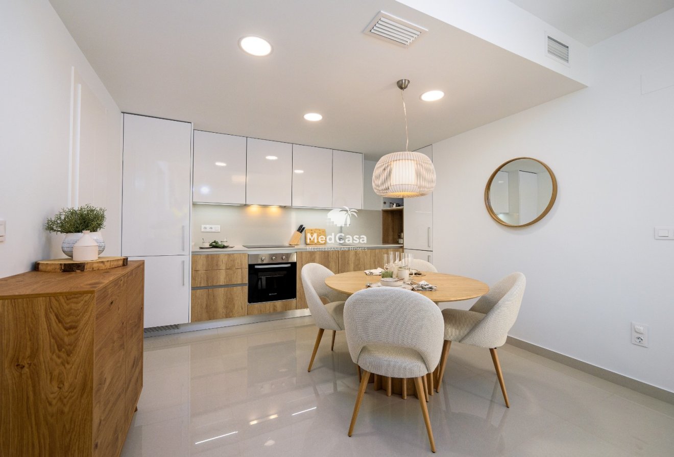 Obra nueva - Apartamento planta baja -
Golf La Finca