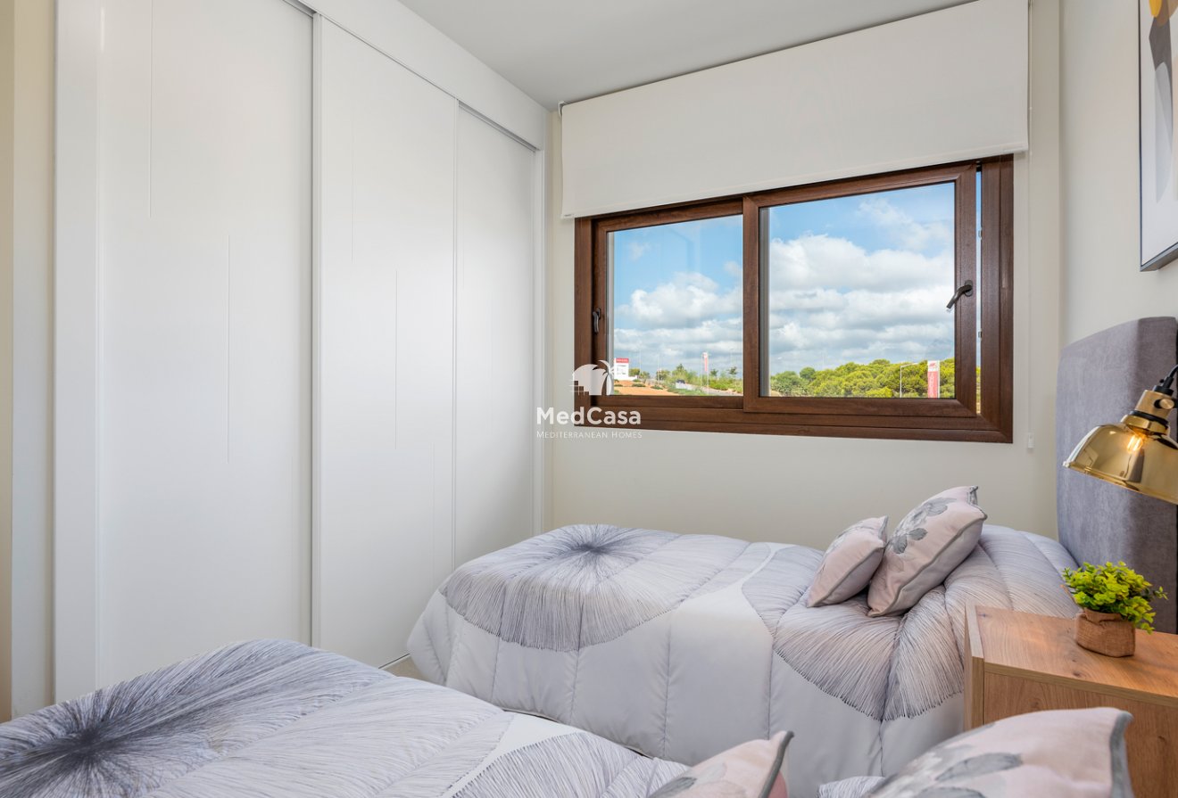 Obra nueva - Apartamento planta baja -
Torrevieja