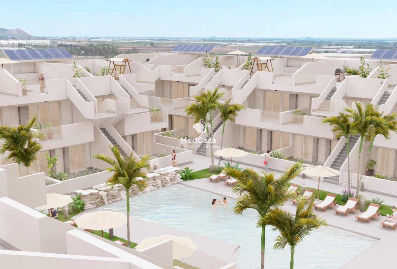 Obra nueva - Apartamento planta baja -
Roldan