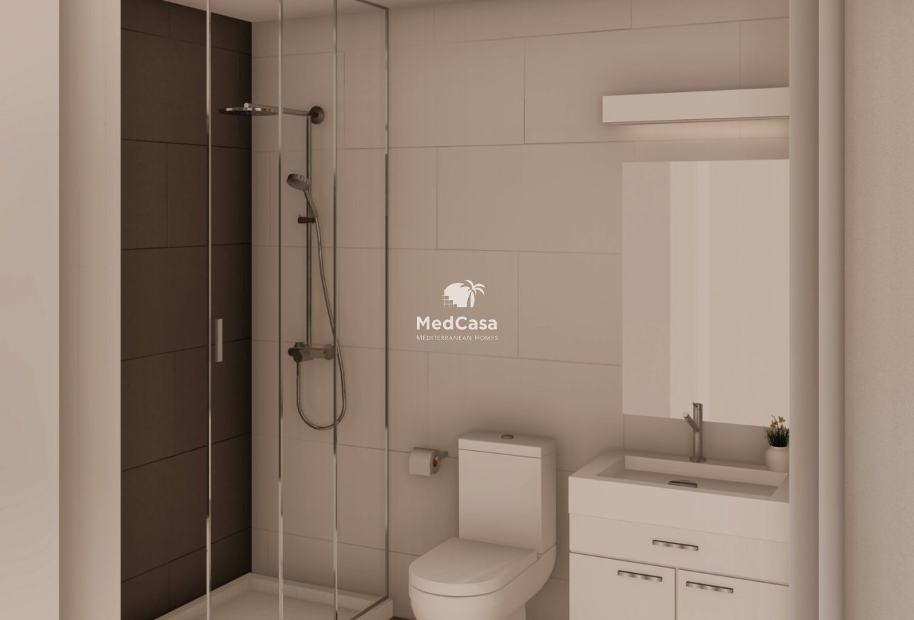 Obra nueva - Apartamento planta baja -
Roldan