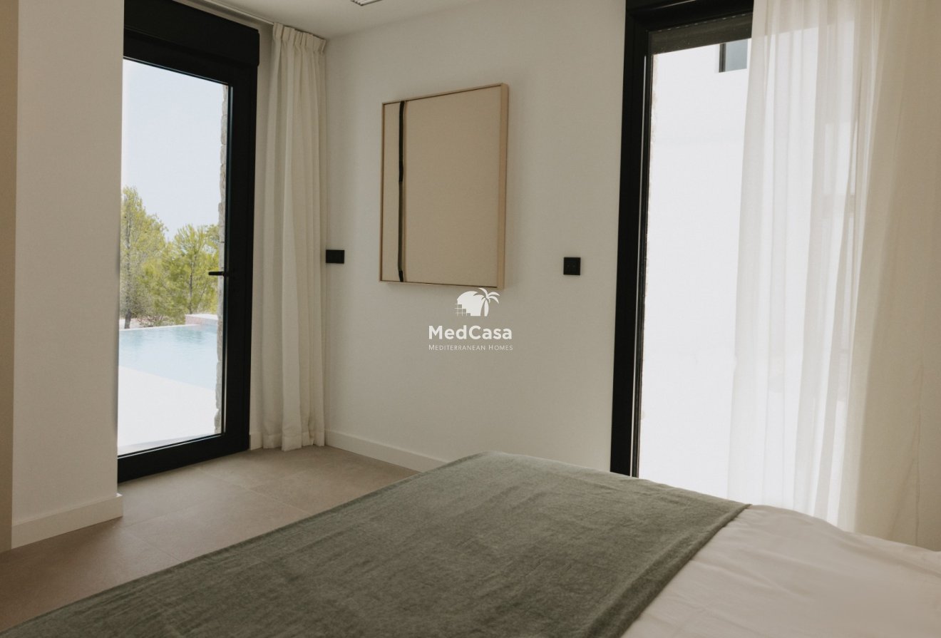 Obra nueva - Villa -
Polop de La Marina