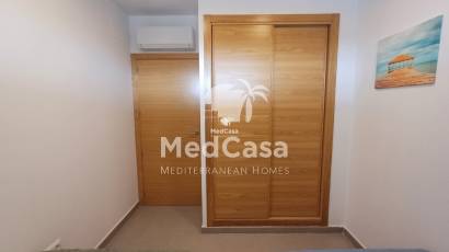 Segunda mano - Apartamento planta baja -
Roldan