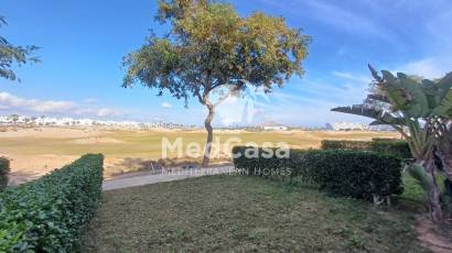 Segunda mano - Apartamento planta baja -
Roldan